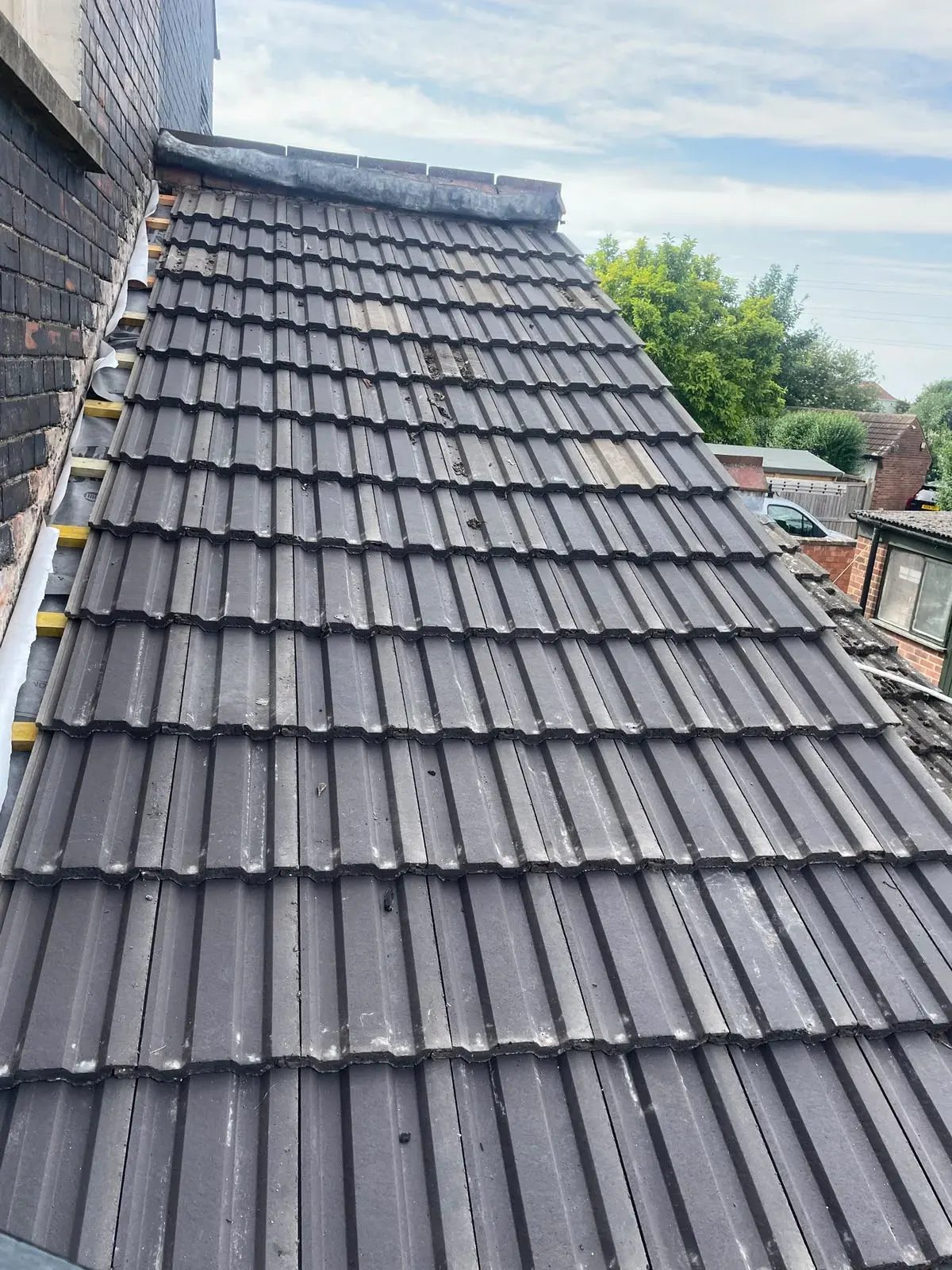 Lead abutment on a concrete tile roof by DJW Roofing & Leadwork