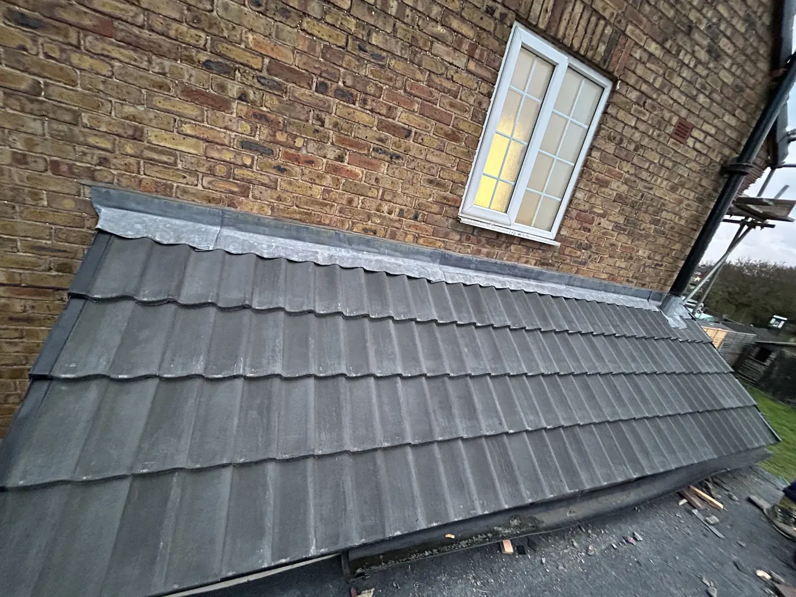 grey concrete tile roof leadwork flashing